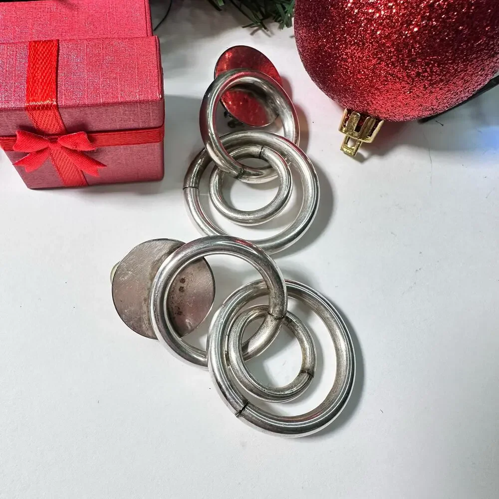 Silver hoop clip on earrings